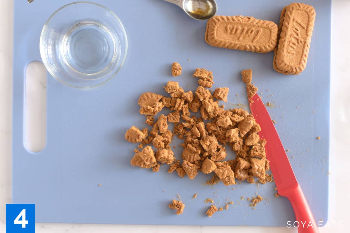 Chopped pieces of biscoff biscuits.