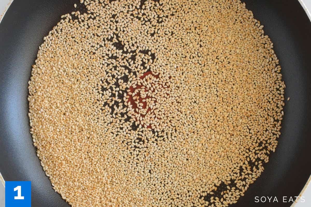 Toasted sesame seeds in a pan.