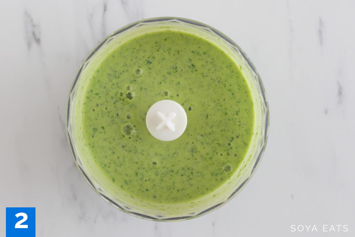 Tofu smoothie with spinach in a blender.