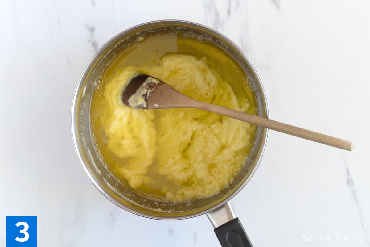 Melted butter and white chocolate in a saucepan.